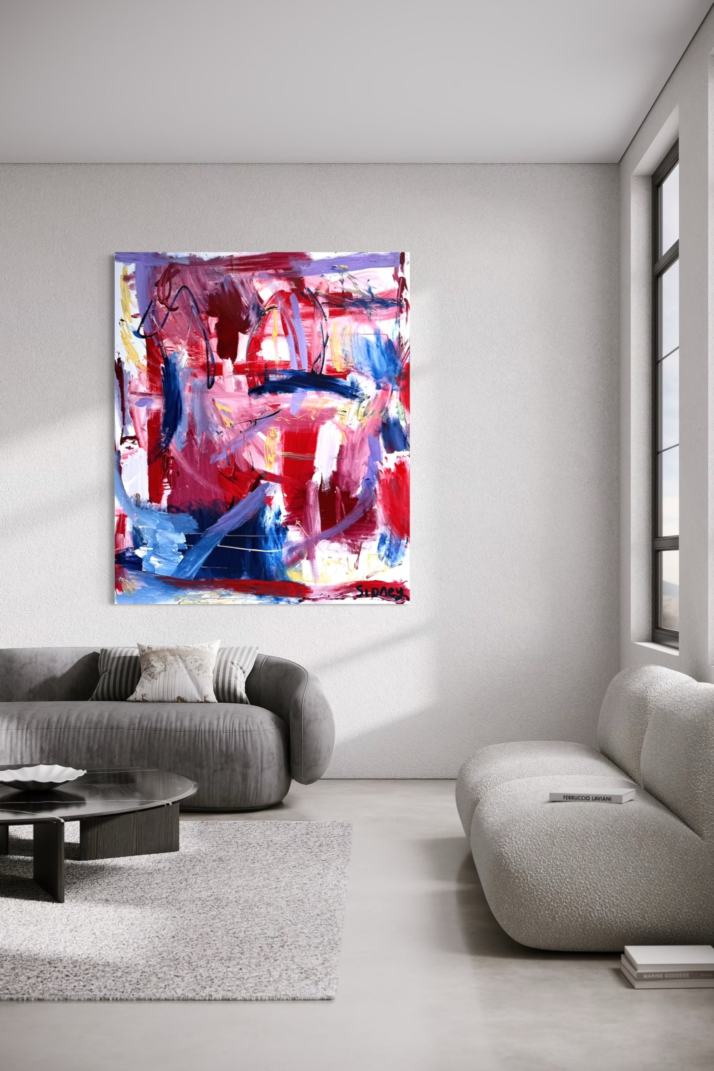 Bold abstract expressionist painting with vibrant hues displayed in a contemporary living room, blending dynamic brushstrokes with modern furnishings